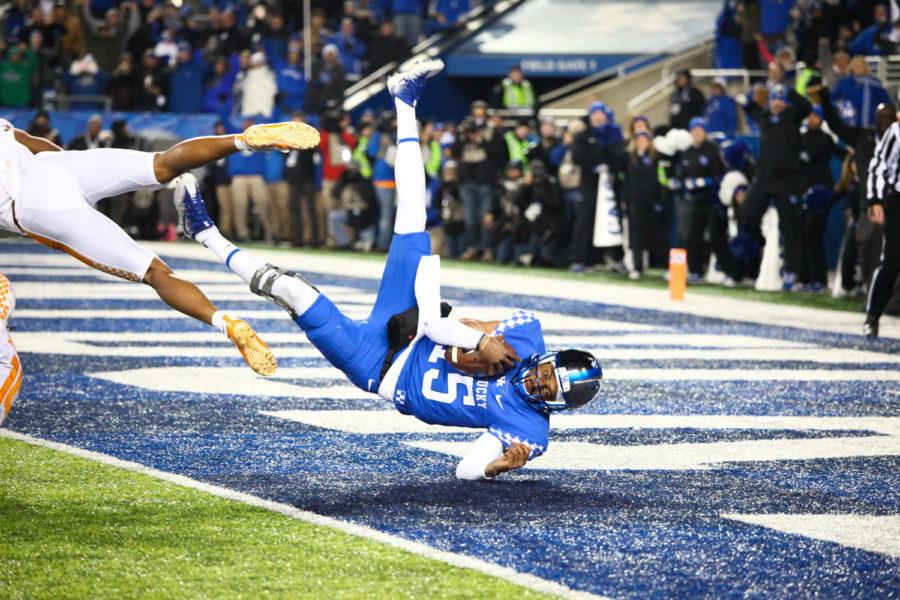 Kentucky Wildcats quarterback Stephen Johnson makes the winning touchdown during the game against Tennessee at Kroger Field in Lexington, Ky. Kentucky won 29-26 on Saturday, October 28, 2017.