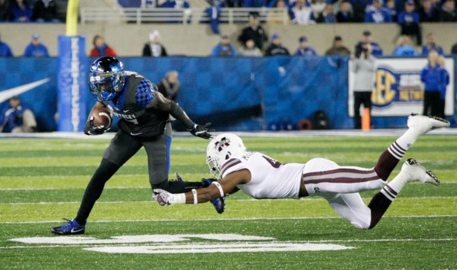 Mississippi State attempts to tackle Kentucky during the game against Mississippi State at Commonwealth on Saturday, October 22, 2016 in Lexington, Ky. Kentucky defeated Mississippi State 40-38. Photo by Lydia Emeric | Staff 