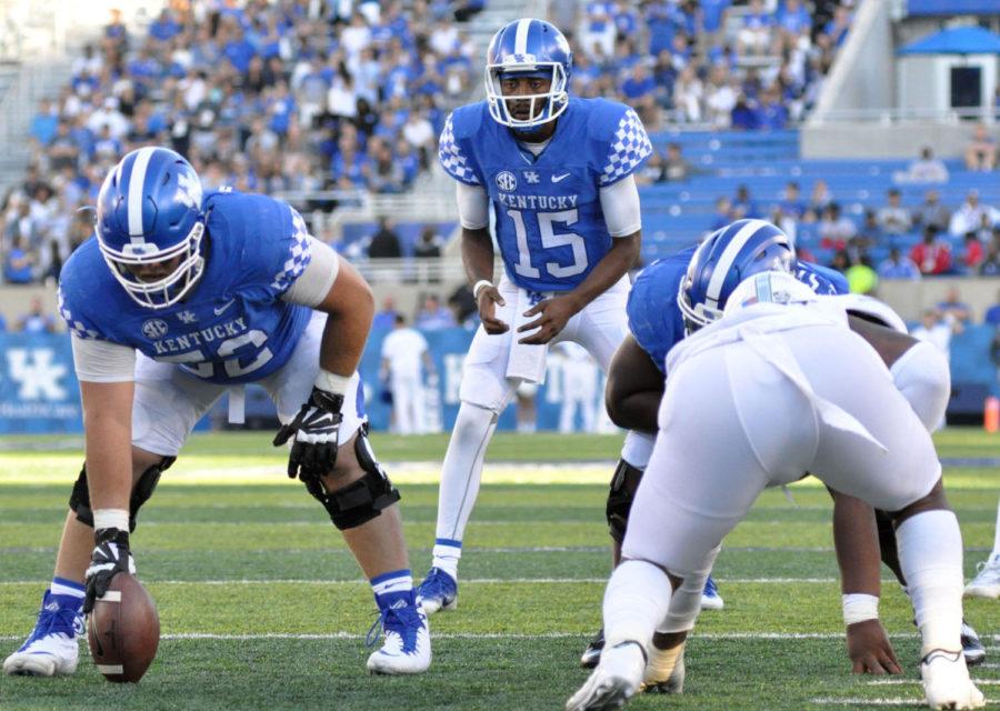 Kentucky quarterback Stephen Johnson prepares to hike the ball during the game against Eastern Michigan on Saturday. September 30, 2017 in Lexington, Kentucky. The Cats won 24 to 20. Photo by Akintunde Nelson | Staff