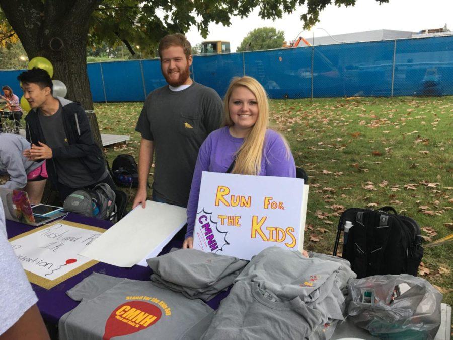 Members of the Phi Delta Epsilon medical fraternity raise money and awareness for the Childrens Miracle Network.