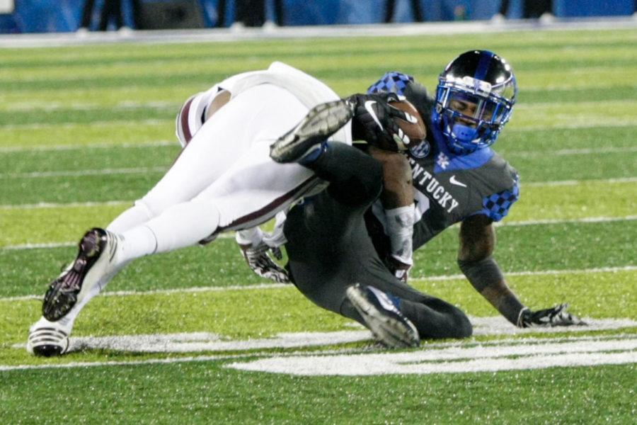Kentucky wide receiver Garrett Johnson gets tackled by Mississippi State during the game against Mississippi State at Commonwealth on Saturday, October 22, 2016 in Lexington, Ky. Kentucky defeated Mississippi State 40-38. Photo by Lydia Emeric | Staff 