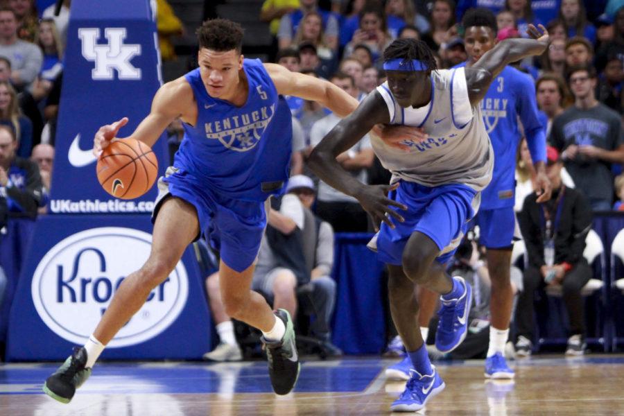 Kentucky+Wildcats+guard+Kevin+Knox+fights+to+grab+a+loose+ball+from+forward+Wenyen+Gabriel+during+the+Blue%2FWhite+game+on+Friday%2C+October+20%2C+2017+in+Lexington%2C+Ky.+Blue+defeated+White+88-67.+Photo+by+Carter+Gossett+%7C+Staff