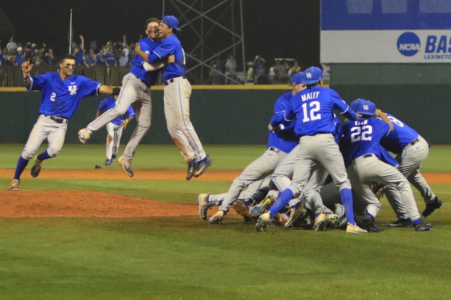 The Kentucky Wildcats baseball team celebrates winning the region championship game of the Lexington Regional at Cliff Hagan Stadium on Tuesday, June 6, 2017 in Lexington, KY. Photo by Addison Coffey | Staff.