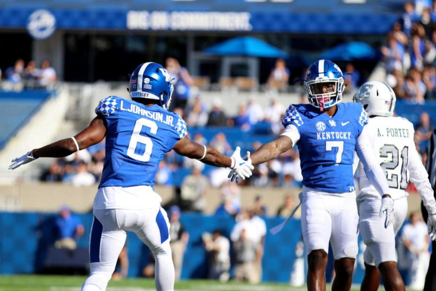 Kentucky cornerback Lonnie Johnson & safety Mike Edwards celebrate a broken up pass during the game against Eastern Michigan on Saturday, September 30, 2017 in Lexington, Ky. Kentucky won 24-20. Photo by Chase Phillips | Staff