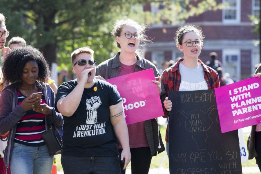 Student activists chant during the counter protest to national anti-abortion group, Created Equals demonstration outside Whitehall Classroom building on Thursday, October 19, 2017 in Lexington, Kentucky. Photo by Arden Barnes | Staff