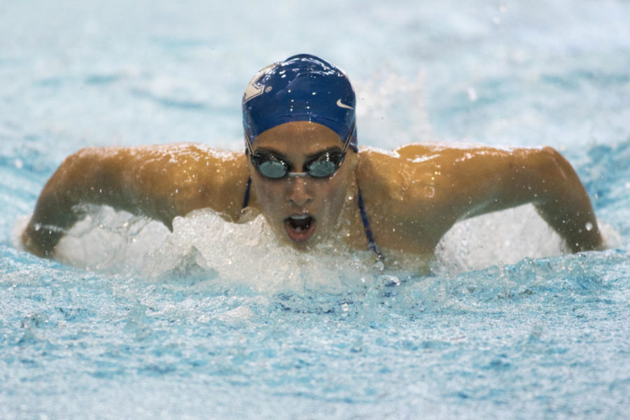Sophomore Asia Seidt swims the butterfly leg of her 400 yard individual medley during the meet against Eastern Michigan on Saturday, October 14, 2017 in Lexington, Kentucky. Photo by Arden Barnes | Staff