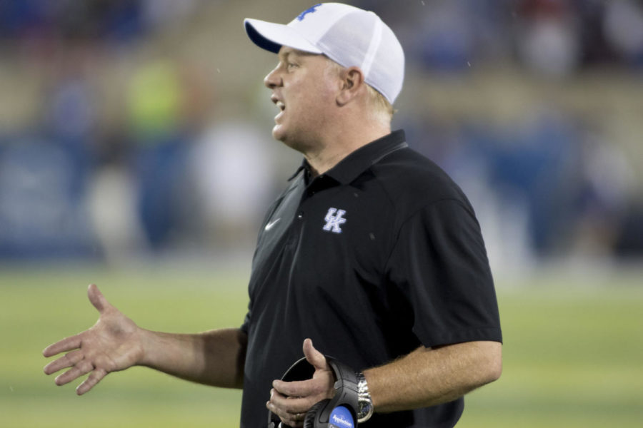 Kentucky head coach Mark Stoops talking to his team from the sideline during the game against Missouri at Kroger Field in Lexington, Ky. on Saturday, October 7, 2017. Photo by Josh Mott | Staff.