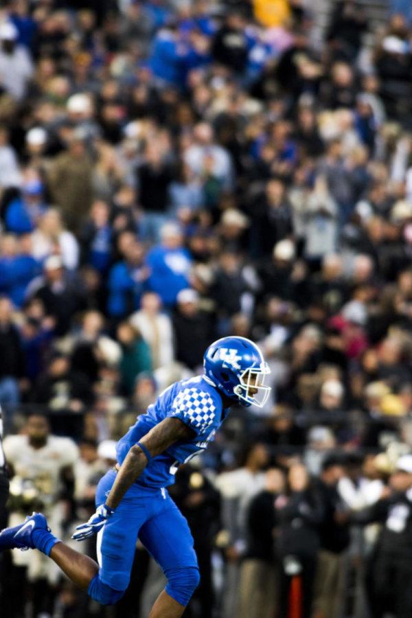 Derrick Baity #8 of the Kentucky Wildcats celebrates after a touchdown during the game against Vanderbilt University on Saturday, November 11, 2017 in Nashville, Tennessee. Kentucky won 44 to 21. Photo by Arden Barnes | Staff