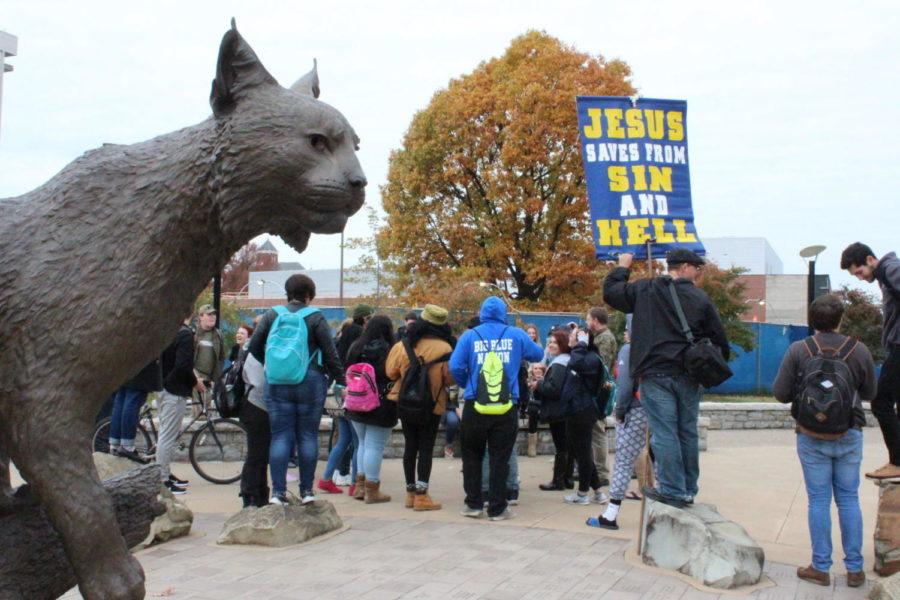 UK Students and members of Campus Ministries USA debate near the Wildcat Statue on Wednesday, Nov. 8, 2017. Campus Ministries USA is a traveling group of preachers. Photo by McKenna Horsley | STAFF