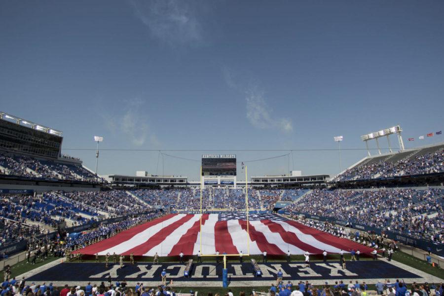 The University of Kentucky ROTC program displays an American flag during the National Anthem prior to the game against EKU on Saturday, September 9, 2017 in Lexington, Ky. Kentucky defeated EKU 27 to 16. Photo by Arden Barnes | Staff