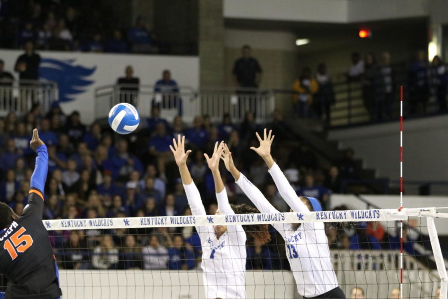 Katz Brown and Leah Edmond block a spike during the match against Florida on Wednesday, November 1, 2017 in Lexington, Ky. Kentucky lost 3-0. Photo by Chase Phillips | Staff
