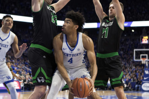 Freshman forward Nick Richards is double-teamed in the post during the game against Utah Valley on Friday, November 10, 2017 in Lexington, Ky. Kentucky won the game 73-63.