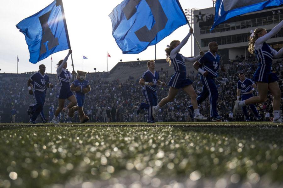 The+University+of+Kentucky+cheerleaders+run+onto+the+field+during+the+game+against+Vanderbilt+University+on+Saturday%2C+November+11%2C+2017+in+Nashville%2C+Tennessee.+Kentucky+won+44+to+21.+Photo+by+Arden+Barnes+%7C+Staff