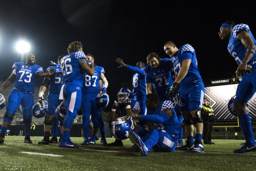 Members+of+the+University+of+Kentucky+football+team+celebrate+after+the+win+against+Vanderbilt+University+on+Saturday%2C+November+11%2C+2017+in+Nashville%2C+Tennessee.+Kentucky+won+44+to+21.+Photo+by+Arden+Barnes+%7C+Staff