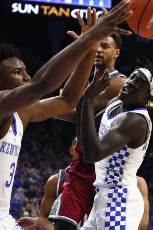 Kentucky fights for a rebound during the game against Troy University on Monday, November 20, 2017 in Lexington, Kentucky. Kentucky won 70-62. Photo by Arden Barnes | Staff