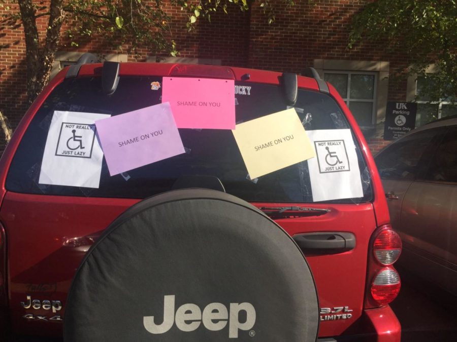 UK first year pharmacy student Lexi Baskin’s car was covered with signs condemning her for parking in a handicapped parking spot on UK’s campus on Oct. 26, 2017.