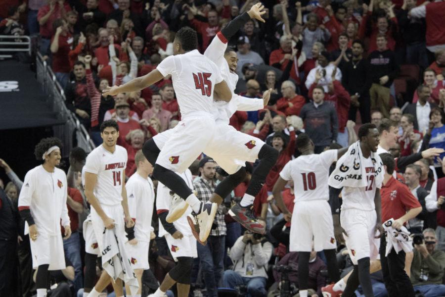 Sophomore+Louisville+guard+Donovan+Mitchell+celebrates+with+a+teammate+after+the+game+on+Wednesday%2C+December+21%2C+2016+in+Louisville%2C+Ky.+Louisville+won+the+game+73-70.