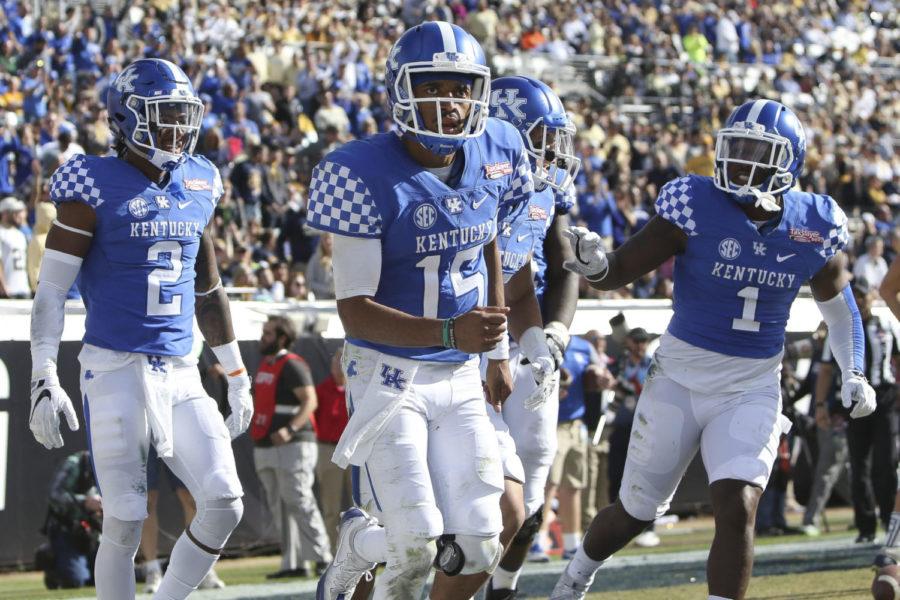 Quarterback+Stephen+Johnson+%2315+of+the+Kentucky+Wildcats+celebrates+after+scoring+a+touchdown+during+the+second+half+of+the+TaxSlayer+Bowl+against+the+Georgia+Tech+Yellow+Jackets+at+EverBank+Field+on+Saturday%2C+December+31%2C+2016+in+Jacksonville%2C+Florida.+Photo+by+Michael+Reaves+%7C+Staff.