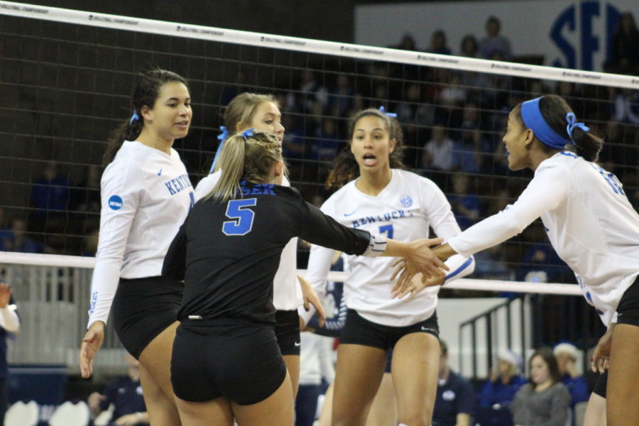 The University of Kentucky women's volleyball team celebrates after winning a point in their sweet sixteen game against BYU. The game was on December 8th, 2017 in Memorial Coliseum. The cats won 3 sets to 2.