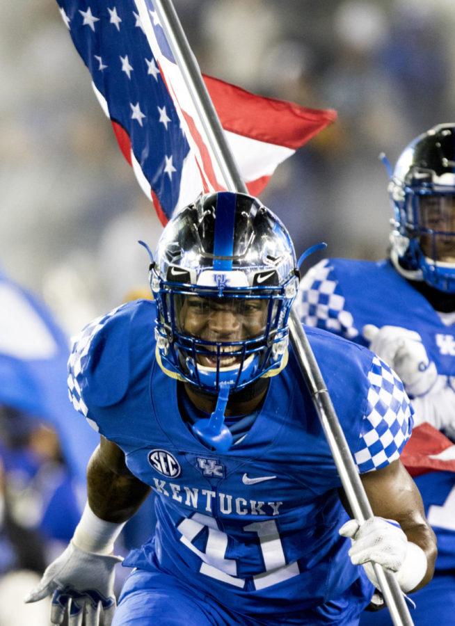 Kentucky+Wildcats+linebacker+Josh+Allen+runs+out+of+the+tunnel+carrying+the+American+flag+prior+to+the+game+against+Tennessee+at+Kroger+Field+on+Saturday%2C+October+28%2C+2017+in+Lexington%2C+Ky.+Kentucky+won+29+to+26.+Photo+by+Arden+Barnes+%7C+Staff