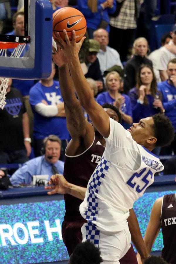 Freshman forward PJ Washington shoots a layup in traffic during the game against Texas A&M on Tuesday, January 9, 2018 in Lexington, Ky. Photo by Hunter Mitchell.