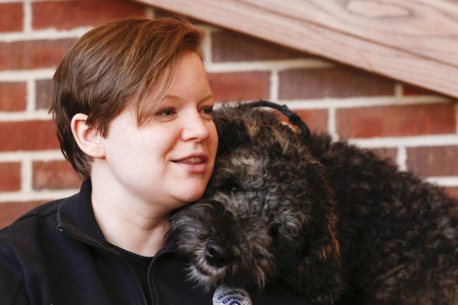 Former UKPD community affairs officer Amy Boatman tells about her 50 page master's thesis written about the use of therapy animals in university police departments on Tuesday, January 23, 2018 in Lexington, Kentucky. Oliver was UK police department's first therapy K-9. Photo by Arden Barnes | Staff
