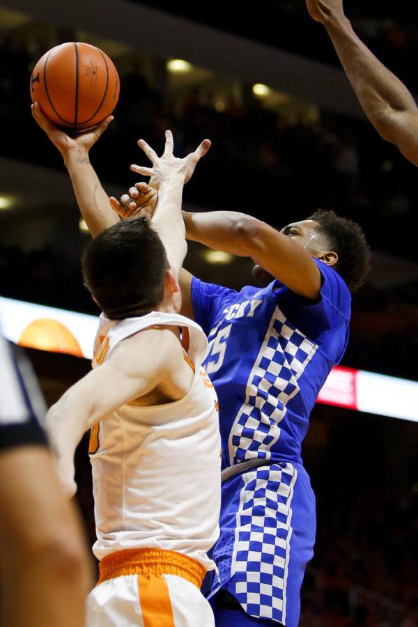 PJ Washington finishes a layup through contact during the first half of the game against the Tennessee Volunteers at Thompson-Boling Arena on Saturday, January 6, 2017 in Knoxville, Tennessee. Photo by Addison Coffey | Staff.