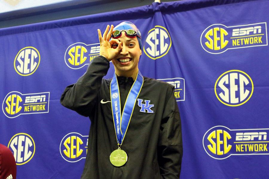 Asia Seidt poses after receiving her gold medal for winning the 100-yard backstroke at the SEC Championships in College Station, Texas on Feb. 17, 2018. Seidt is the first UK swimmer in program history to win the 100-yard backstroke at the SEC Championships. Photo by Russell James.