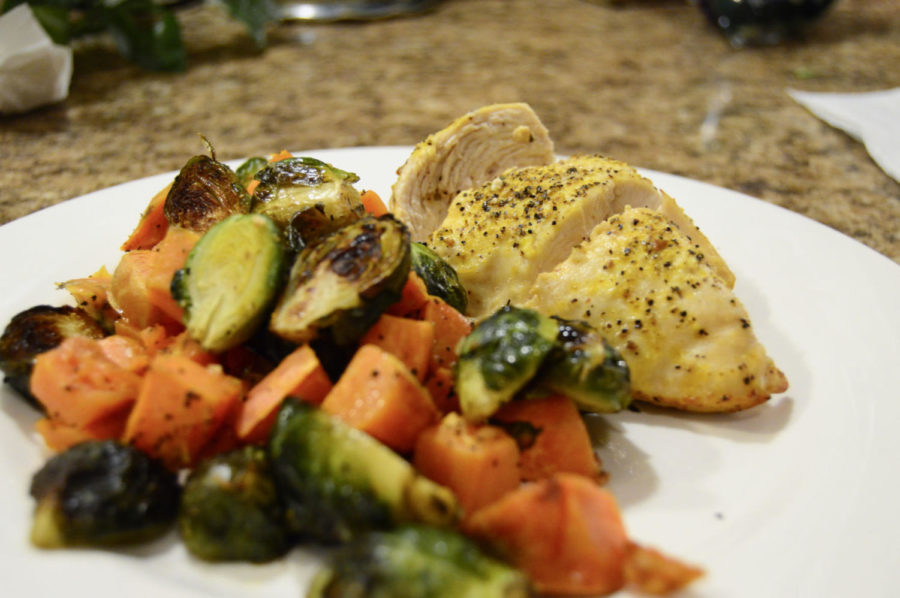 Lemon+pepper+chicken+with+roasted+sweet+potatoes+and+brussel+sprouts+is+an+easy+and+healthy+meal+to+fix.%C2%A0Jillian+Jones+%7C+Staff
