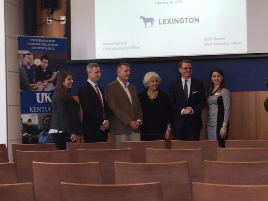 Lexington Mayor Jim Gray and LexGig officials pose for a picture after their presentation in Woodward Hall on Monday, Feb. 26, 2018. Photo by Noah Oldham