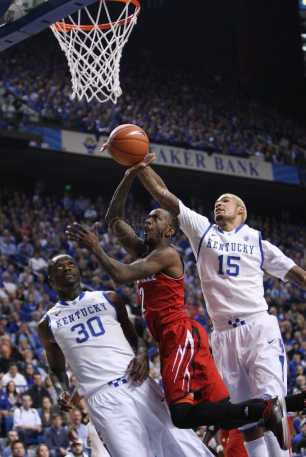 during the first half of UK Mens Basketball vs. Louisville at Rupp Arena in Lexington, Ky., on Saturday, December 28, 2013. UK leads Louisville xx to xx at the half. Photo by Emily Wuetcher