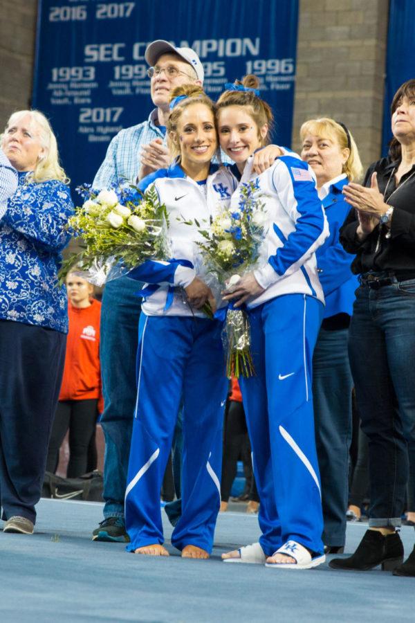 Kentucky seniors Katie Carlisle and Cori Rechenmacher are recognized after the final home meet of the season against Ohio State on Friday, March 2, 2018 in Lexington, Ky. Photo by Jordan Prather | Staff