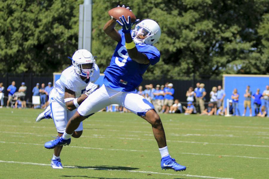 Kentucky Wildcats receiver Garrett Johnson makes a catch during the open practice at the Joe Craft Football Training Facility on Saturday, August 5, 2017 in Lexington, KY. Photo by Addison Coffey | Staff