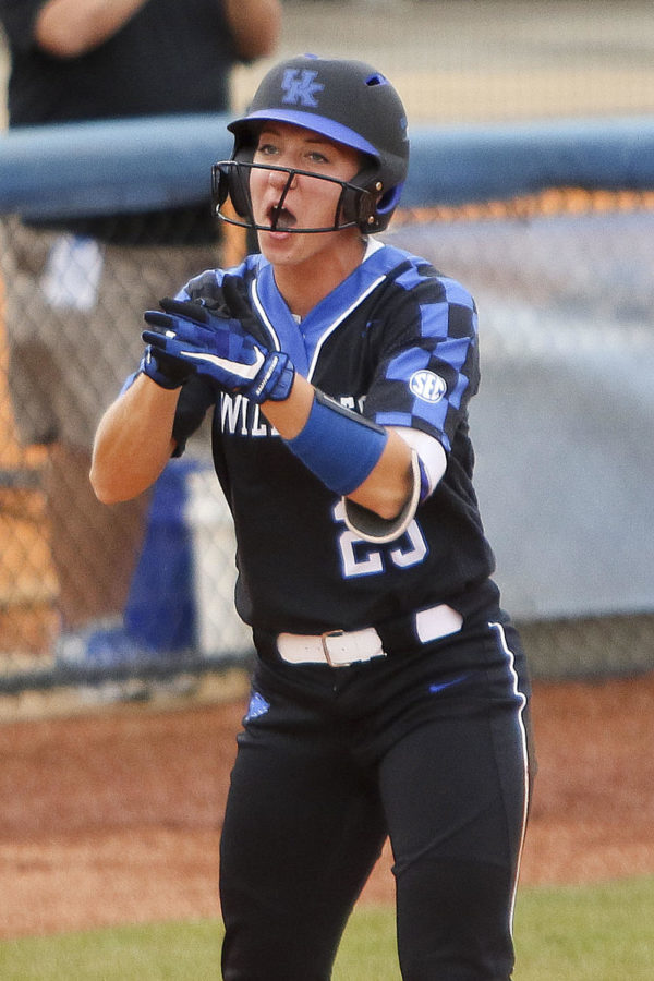 Kentucky Wildcats outfielder Brooklin Hinz celebrates after her triple in the first inning of the championship game of the Lexington Regional at John Cropp Stadium on Sunday, May 21, 2017 in Lexington, KY. Photo by Addison Coffey | Staff.