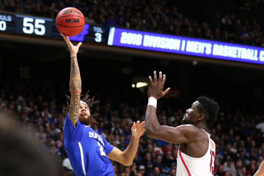 Buffalo junior guard Jeremy Harris goes in for a layup during the game against Arizona in the first round of the NCAA tournament on Thursday, March 15, 2018, in Boise, Idaho. Photo by Arden Barnes | Staff