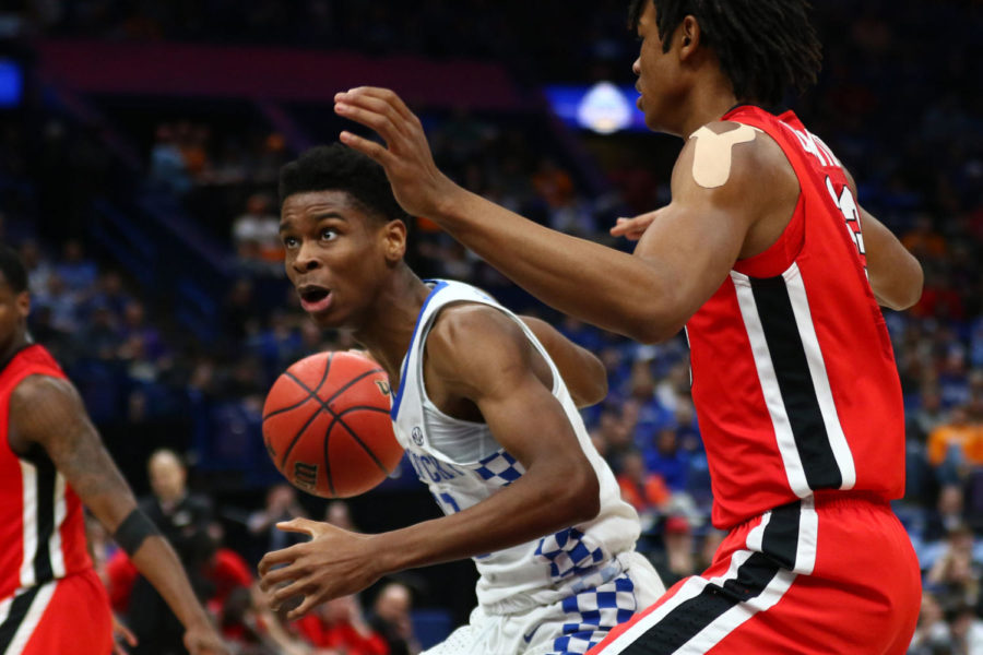 Kentucky freshman guard Shai Gilgeous-Alexander drives towards the basket during the game against Georgia in the SEC tournament quarterfinals on Friday, March 9, 2018, in St. Louis, Missouri. Kentucky won 62-49. Photo by Arden Barnes | Staff