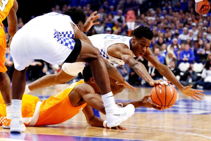 Kentucky freshman guard Shai Gilgeous-Alexander fights for the ball during the game against Tennessee at Rupp Arena on Tuesday, February 6, 2018 in Lexington, Ky. Photo by Arden Barnes | Staff