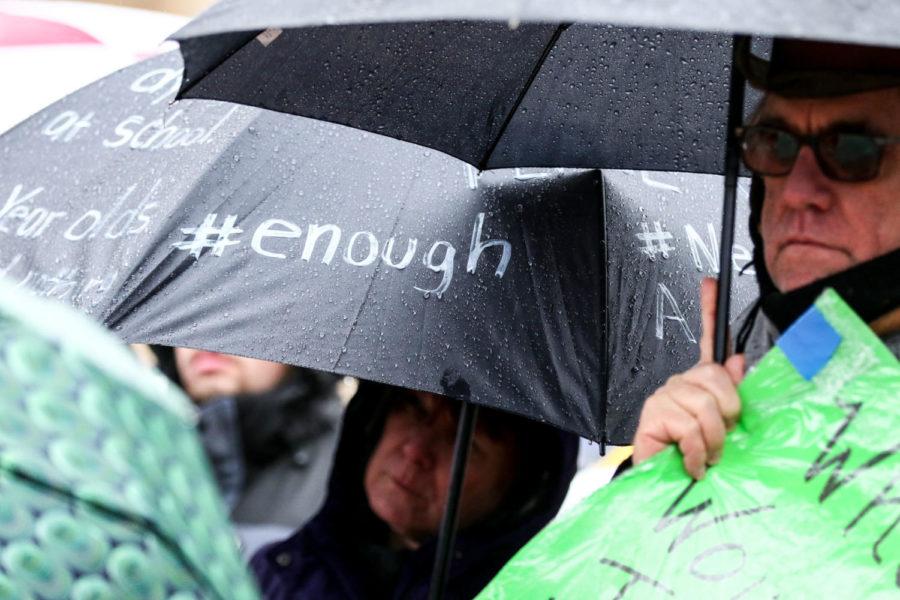 A+protestor+holds+an+umbrella+with+handwritten+statements+calling+for+change+during+the+March+for+Our+Lives+Lexington+on+Saturday%2C+March+24%2C+2018%2C+in+Lexington%2C+Kentucky.+The+march+was+held+in+solidarity+with+gun+violence+protests+across+the+country.+Photo+by+Arden+Barnes+%7C+Staff