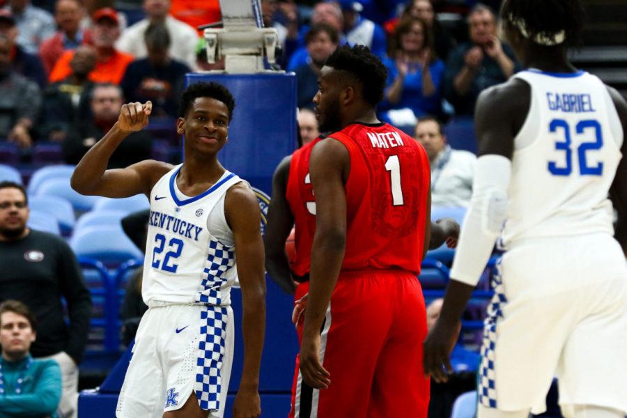 Kentucky freshman guard Shai Gilgeous-Alexander celebrates after making a basket during the game against Georgia in the SEC tournament quarterfinals on Friday, March 9, 2018, in St. Louis, Missouri. Kentucky won 62-49. Photo by Arden Barnes | Staff