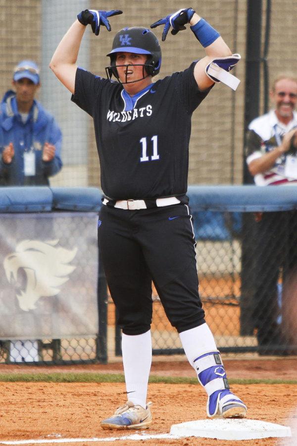 Kentucky Wildcats third baseman Abbey Cheek celebrates her triple in the third inning of the championship game of the Lexington Regional at John Cropp Stadium on Sunday, May 21, 2017 in Lexington, KY. Photo by Addison Coffey | Staff.