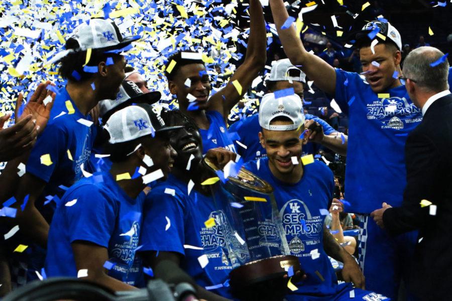 The Kentucky mens basketball team celebrates after the game against Tennessee in the SEC tournament championship on Sunday, March 11, 2018, in St. Louis, Missouri. Kentucky defeated Tennessee 77-72. Photo by Arden Barnes | Staff