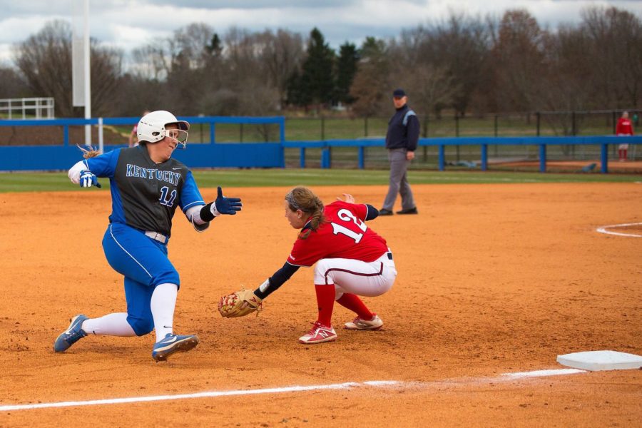 Abbey Cheek slides into third base for one of her two triples against Dayton in Kentucky's home-opener at John Cropp Stadium in Lexington, Ky. on March 1, 2018. Photo by Jordan Prather