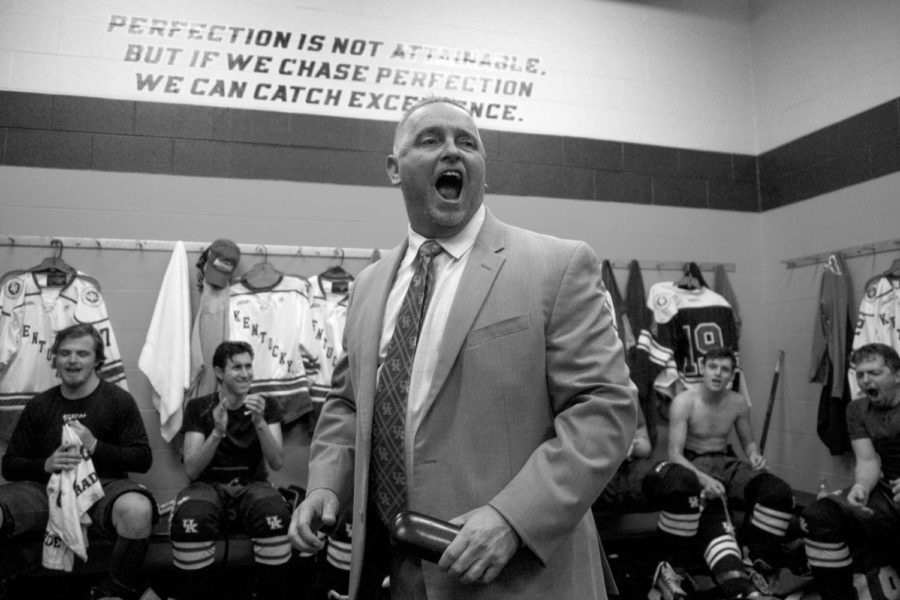 Coach Tim Pergram celebrates in the locker room after they defeated South Carolina in the SEC tournament, the first ever in program history.