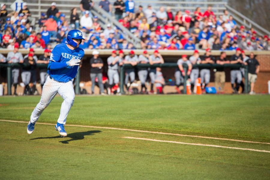 University of Kentucky junior Ryan Johnson runs to first base during the game against Louisville on Tuesday, April 3, 2018 in Lexington, Ky. Photo by Jordan Prather | Staff
