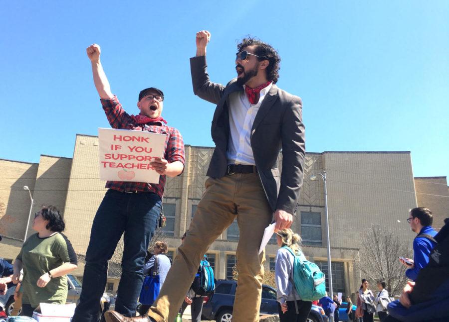 Drew Vant Land, the organizer of the rally and UK philosophy graduate student, and Samuel Lockridge, a UK public administration graduate student, led protestors in chants during the #KY120 Solidarity Rally by the Bowman statue on the University of Kentucky campus on Thursday, April 12, 2018 in Lexington, Kentucky. Photo by Arden Barnes | Staff