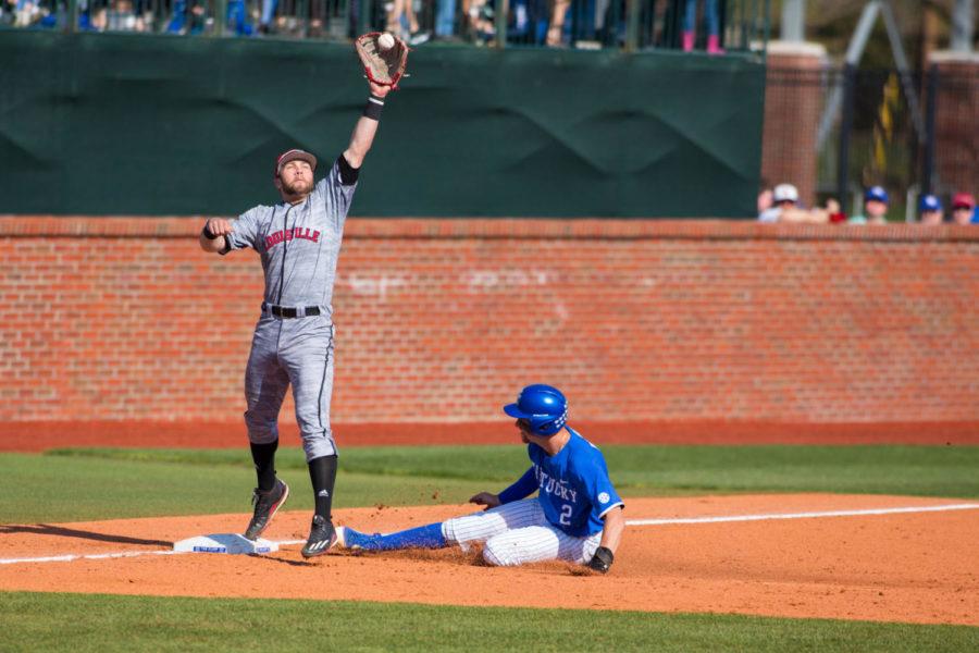 University of Kentucky junior Trey Dawson slides into third during the game against Louisville on Tuesday, April 3, 2018 in Lexington, Ky. Photo by Jordan Prather | Staff