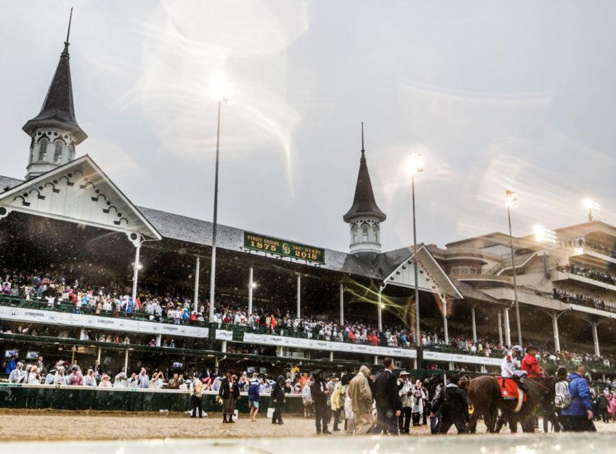 Justify%2C+with+Mike+Smith+up%2C+wins+the+144th+Kentucky+Derby+at+Churchill+Downs+on+Saturday%2C+May+5%2C+2018+in+Louisville%2C+Kentucky.+Photo+by+Arden+Barnes+%7C+Staff