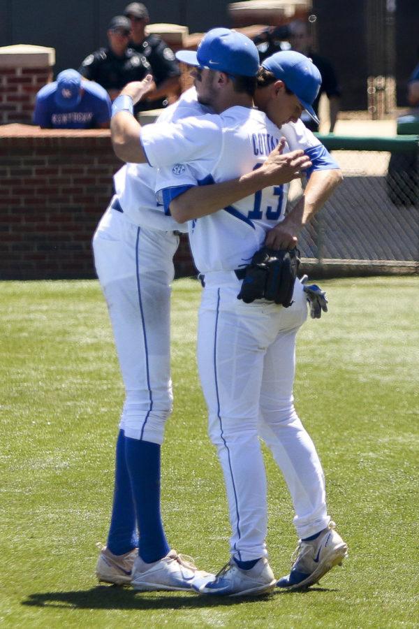 Kentucky Wildcats pitcher Sean Hjelle hugs Kole Cottam after exiting the game in the eighth inning of the first round game of the Lexington Regional at Cliff Hagan Stadium on Friday, June 2, 2017 in Lexington, KY. Photo by Addison Coffey | Staff.