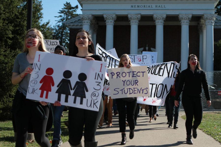 UK Feminist Alliance marches campus to protest sexual assault at the University of Kentucky in Lexington, Ky., on Nov. 11, 2016. The group demanded for the university administration to release the redacted sexual assault records involving former professor James Harwood. Photo by Joshua Qualls | Staff