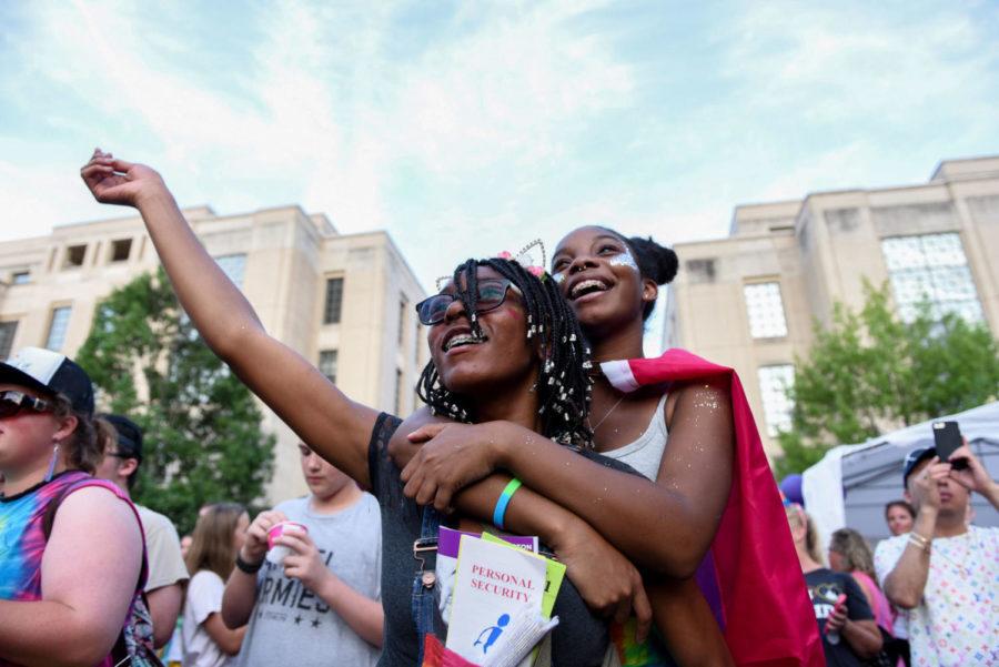Natalia Smith, 16, and Aniaya Timberlake, 16, dance in the crowd surrounding the stage during Lexingtons Pride Festival on Saturday, June 30, 2018, in Lexington, Kentucky. Photo by Arden Barnes | Staff